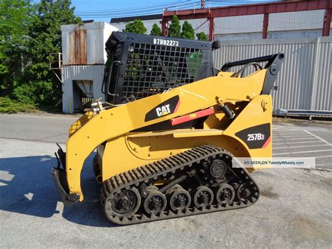 cat skid steer auxiliary hydraulics|cat skid steer power distribution.